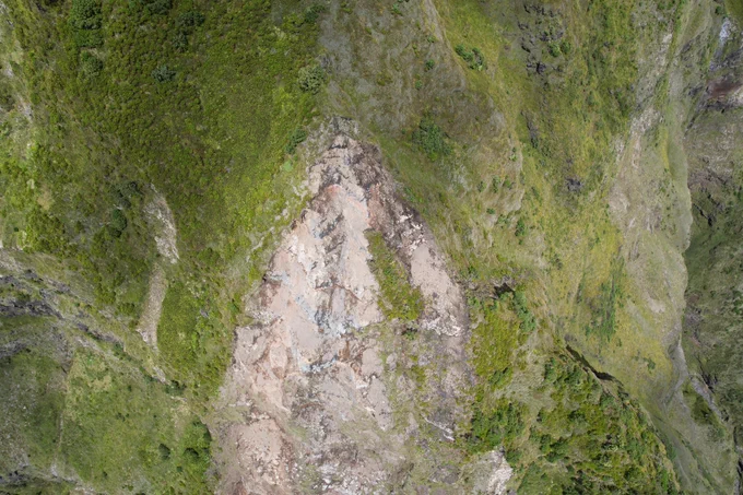 Source area for one of the landslides on the main cliffs behind the Settlement ca. 600m above sea level. One detached block can initiate a series of movements, which could lead to a chain reaction in landslide-prone areas.