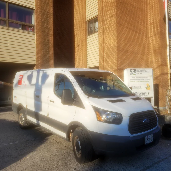 The Easter Seals Nova Scotia delivery van parked outside the Dartmouth Seniors Service Centre.