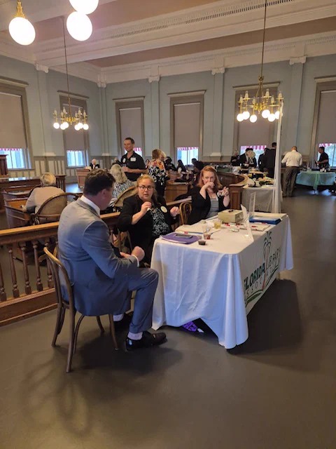 photo of F.L.A. tabling at Library Day