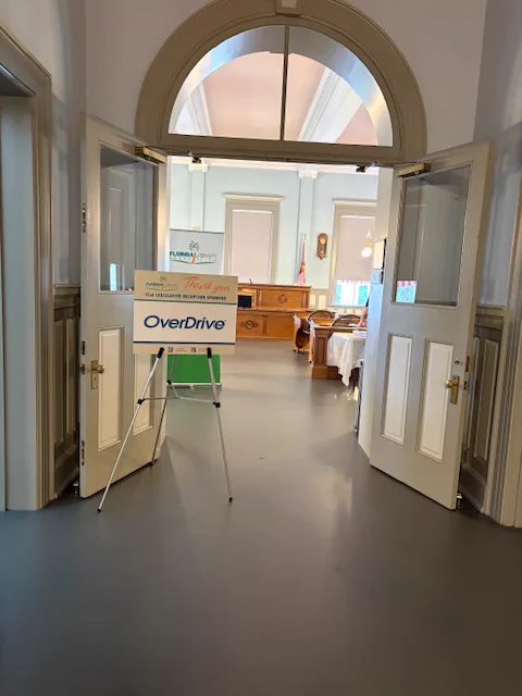 photo of a sign that says OverDrive outside of the meeting space