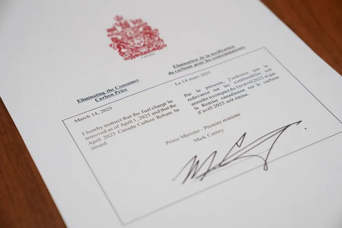 A photo of the document signed by Prime Minister Mark Carney providing a directive to eliminate the consumer carbon price.