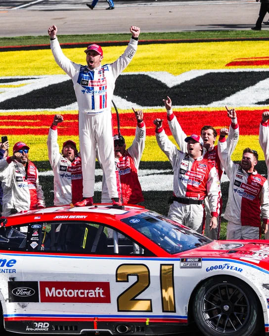 Josh Berry celebrates on top of the No. 21 car on the frontstretch in Las Vegas.