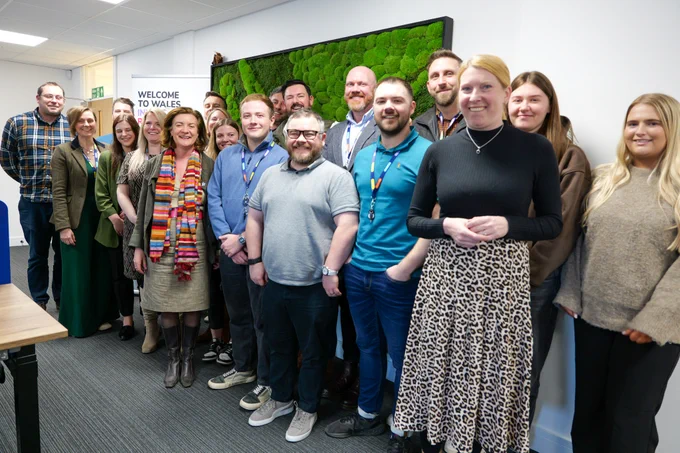 First Minister in a group photo with the staff of Delineate at their headquarters in Llandysul, Ceredigion.