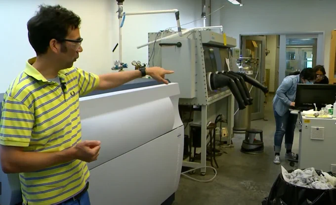 Iowa State researcher Aaron Sadow in lab.