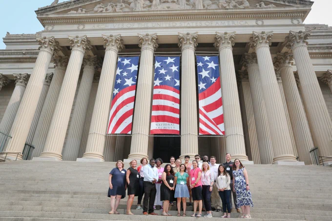 Civics for All of US Teacher Institute participants pose for a group photo at the National Archives in Washington, DC.