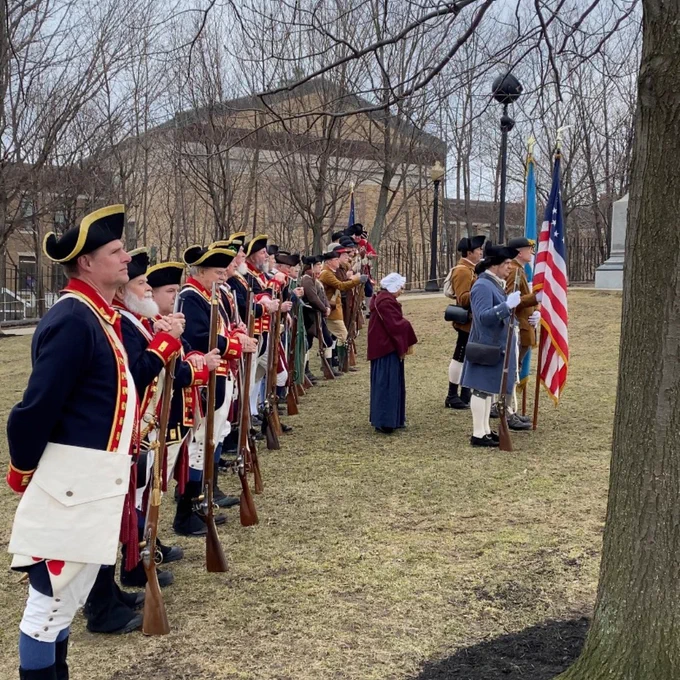 Colonial militia reenactors lining up at Bunker Hill. 