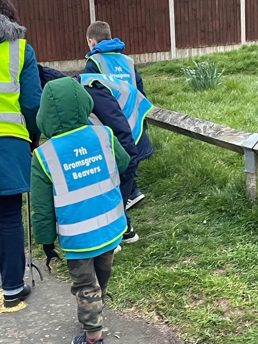 Beaver scouts collecting litter with litter pickers
