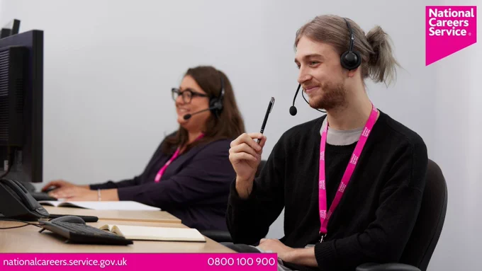Two careers advisers sat at desks wearing headsets. Top right is the National Careers Service logo and bottom left reads: "nationalcareers.service.gov.uk / 0800 100 900". 