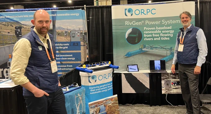 Booth 109, where attendees talked with ORPC's Matthew Barrington, Stuart Davis, and (not pictured) Jarlath McEntee