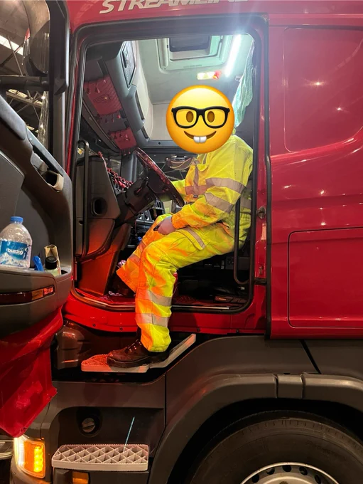 DVSA vehicle examiner sitting in HGV cab