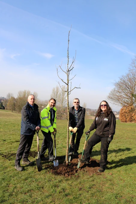 Image showing Council officers with Council Leader Gordan Low and Lorne Campbell, Development Manager of Clyde Climate Forest planting a tree in Etive Park, Bishopbriggs