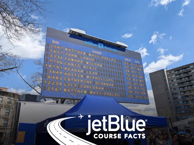 Photo of the JetBlue Arrivals Board in Coolidge Corner at the 128th Boston Marathon presented by Bank of America
