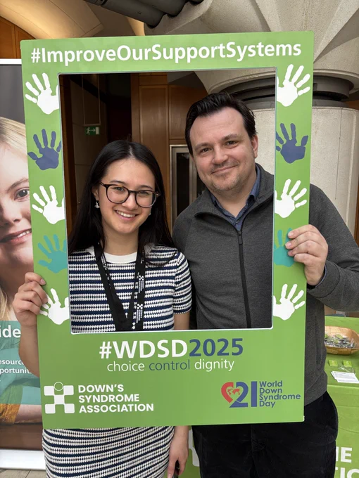 Lydia and Chris from DSA holding a selfie frame