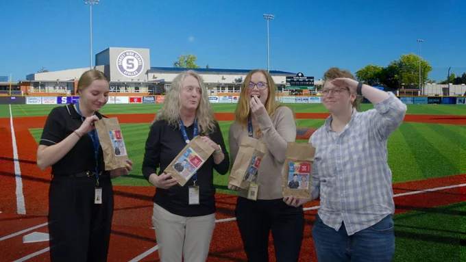 Kentucky Department of Education employees ate popcorn in honor of Eli Hill after the Team KDE meeting this week.