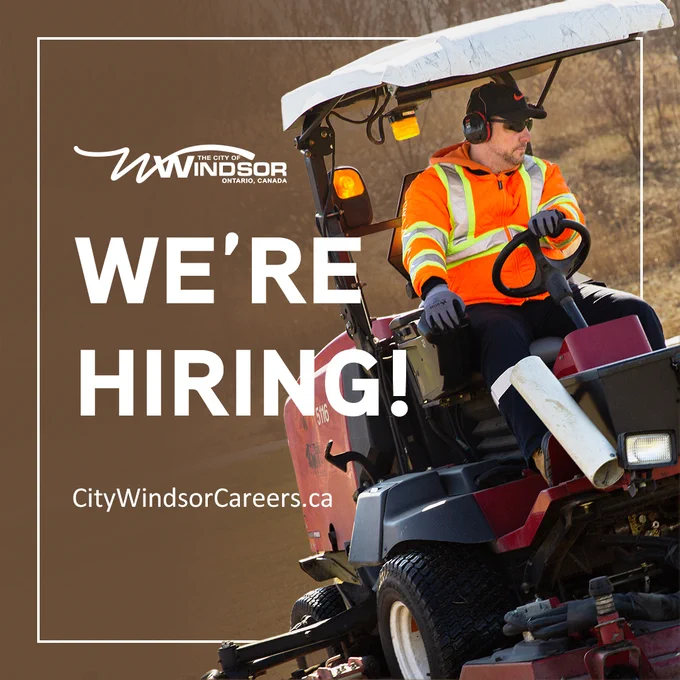 Words, We're Hiring! Web address CityWindsorCareers.ca and a parks staff member riding a lawnmower to cut grass
