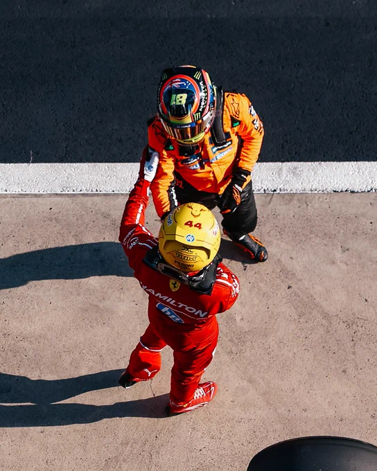 Oscar and Lewis congratulating one another