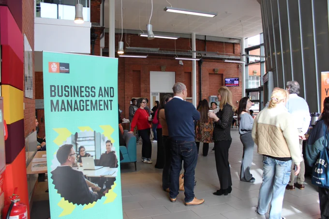Photographs showing guests at our Applicant Visit Day, interacting with our professors and student ambassadors and attending information sessions 