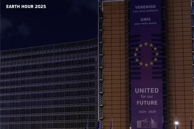 Nighttime view of the Berlaymont building in Brussels showcasing its environmentally conscious approach with all lights switched off. 