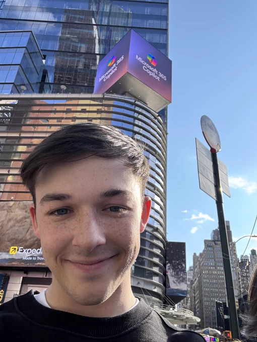 lewis selfie with the Microsoft cube in the background