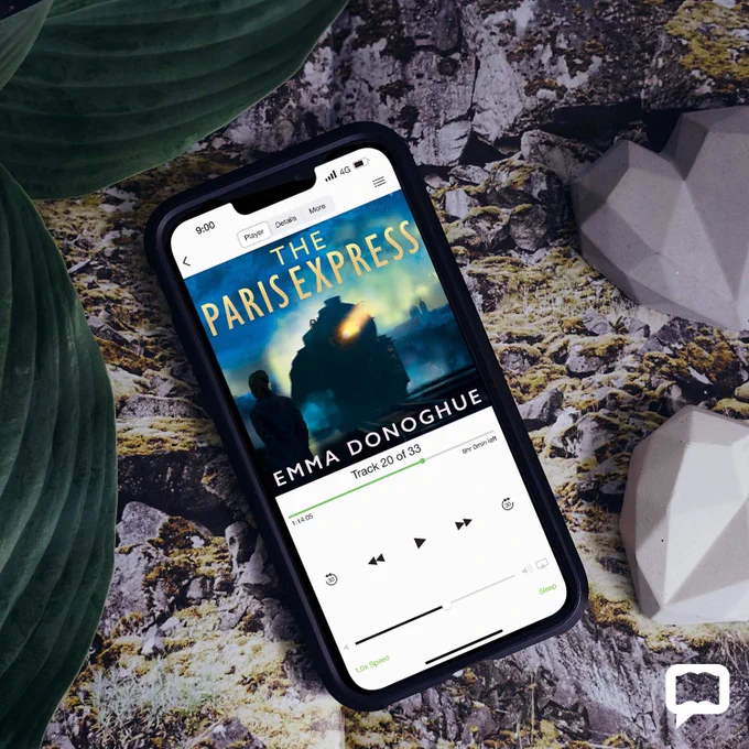 Mobile phone playing eaudiobook of The Paris Express by Emma Donoghue