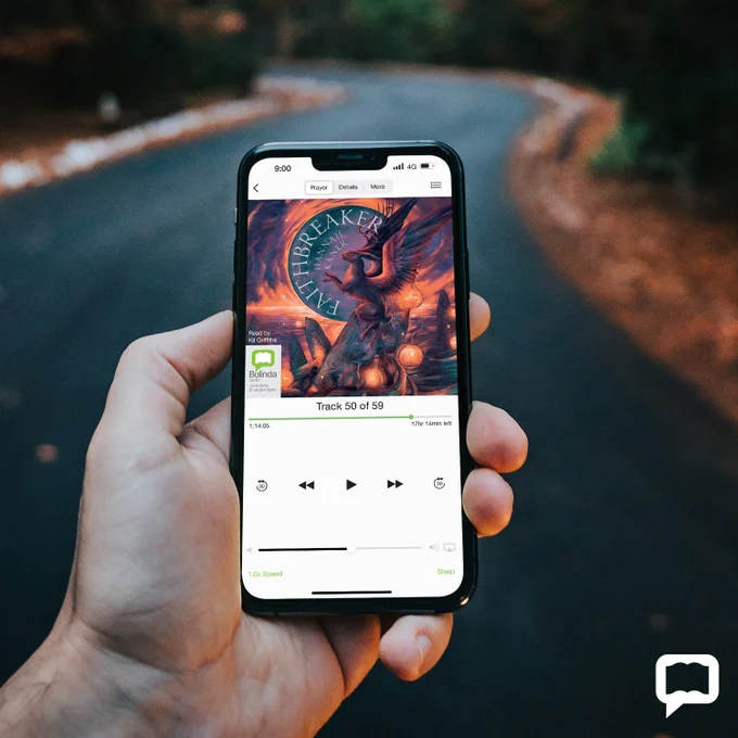 Hand holding mobile phone playing eaudiobook of Faithbreaker by Hannah Kaner
