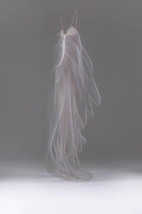 Whispery, ghost-like
 white dress 