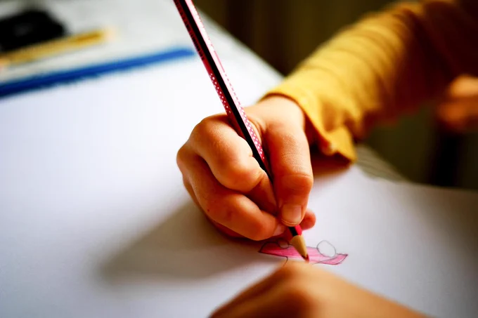 A young pupil drawing a picture