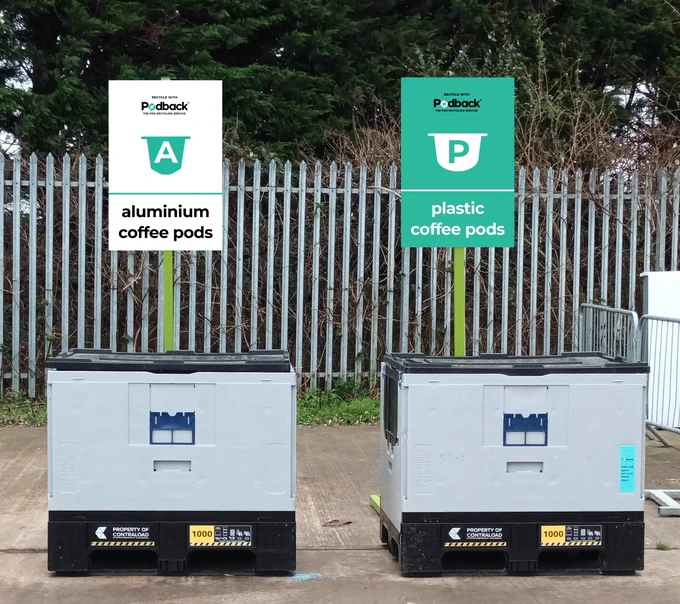 Containers at a household waste recycling centre for aluminium and plastic coffee pods. 