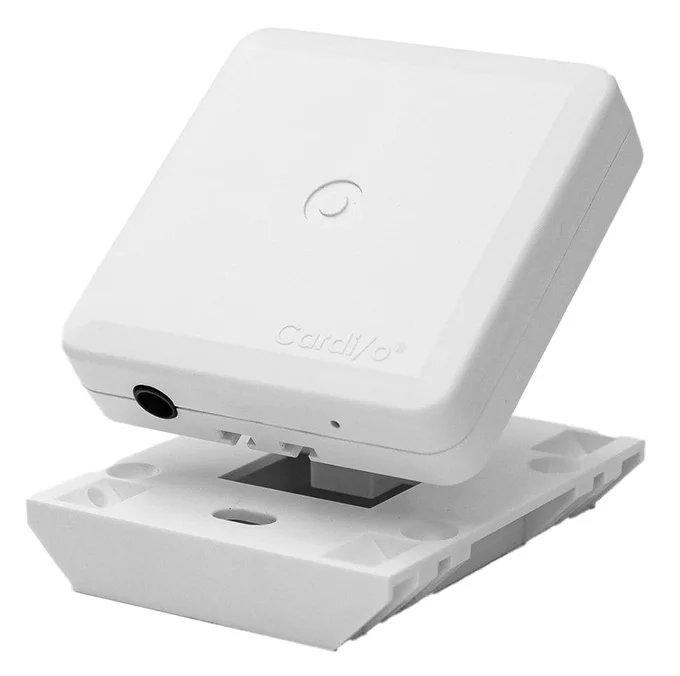 A square shaped device on a trapezoidal mount, "Cardi/o" is imprinted on the surface