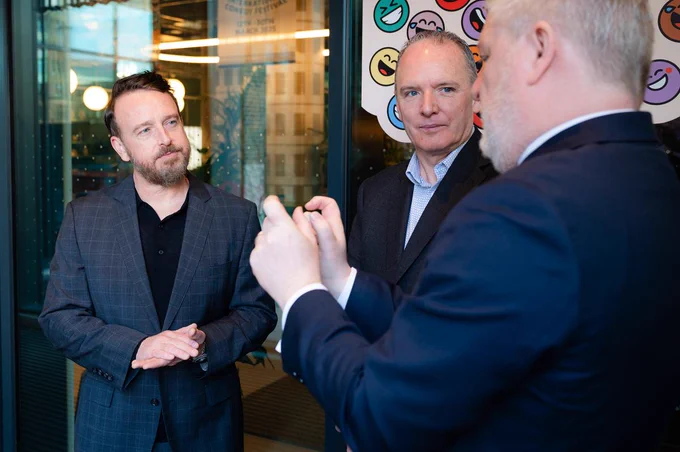 Image of Chris Ferriter of Halon standing talking to Angus Robertson MSP, Scotland's Culture Secretary and Adrian Gillespie, Scottish Enterprise CEO.