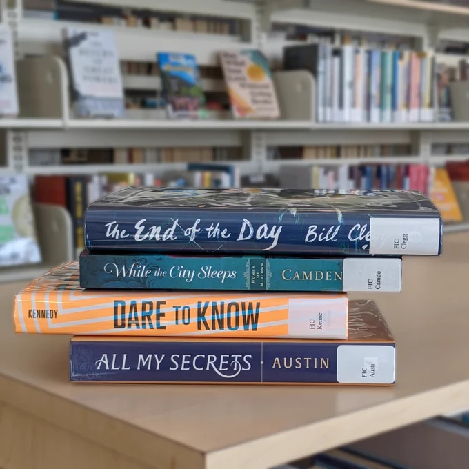 Book spine poem reading:

The end of the day
while the city sleeps
dare to know
all my secrets
