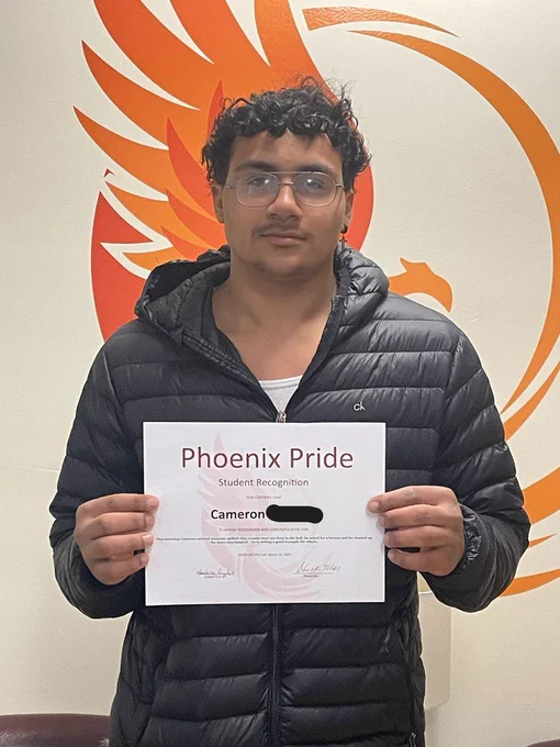 student with certificate