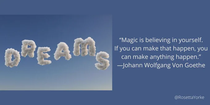 The word 'Dreams' floating like cloud letters in a blue sky.