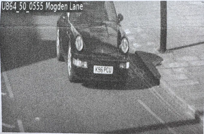 A Porsche 964 captured by a ULEZ camera in Greater London.