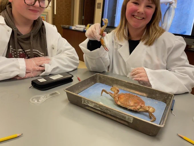 These students explore a claw