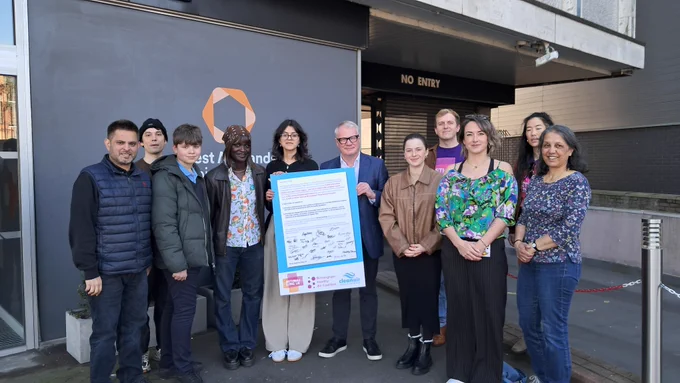 Local campaigners and mayor richard parker holding an open letter to take bold action on clean air.