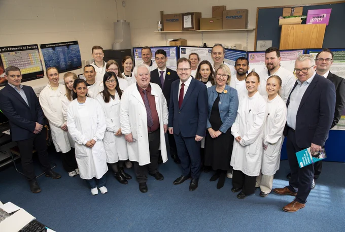  Minister Lawless visiting the MU Department of Biology research team
