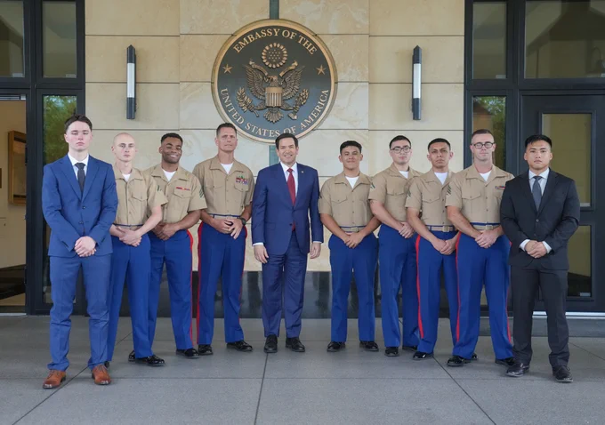 Secretary Marco Rubio poses for a group photo with U.S. Marines at U.S. Embassy Kingston in Kingston, Jamaica, March 26, 2025. (Official State Department photo by Freddie Everett)
