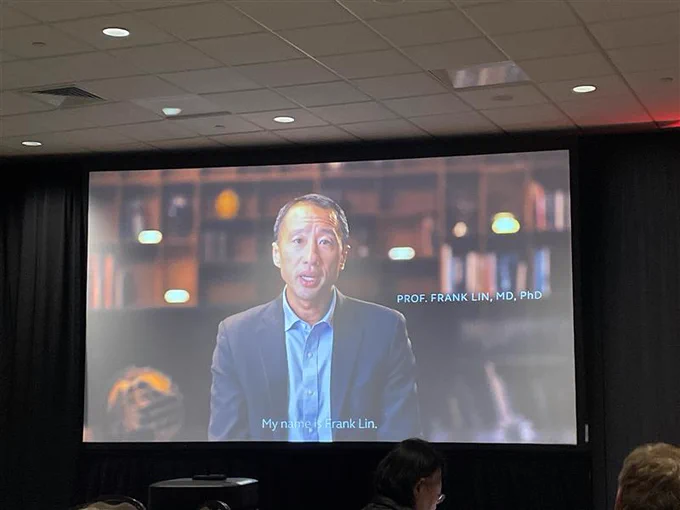Dr. Frank R. Lin, professor at Johns Hopkins Bloomberg School of Public Health, on a video screen during ReSound's special event at the AAA2025 Conference, March 26, 2025.