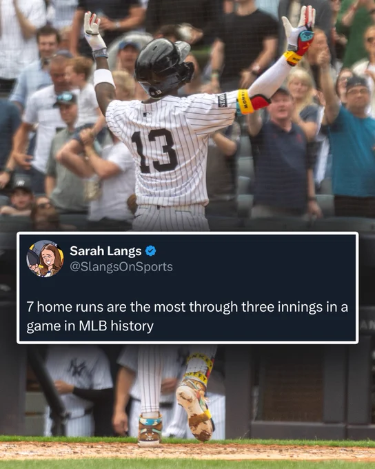 Jazz Chisholm Jr. crosses home plate after hitting a home run Saturday afternoon. He is wearing a home white Yankees uniform with pinstripes.
A tweet from Sarah Langs is overlayed saying, "7 home runs are the most through three innings in a game in MLB history"