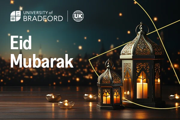 Social media graphic of lanterns, candles and the text 'Eid Mubarak'