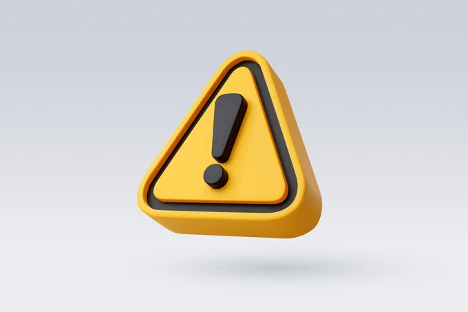 A 3D sign with an exclamation mark in a yellow triangle.