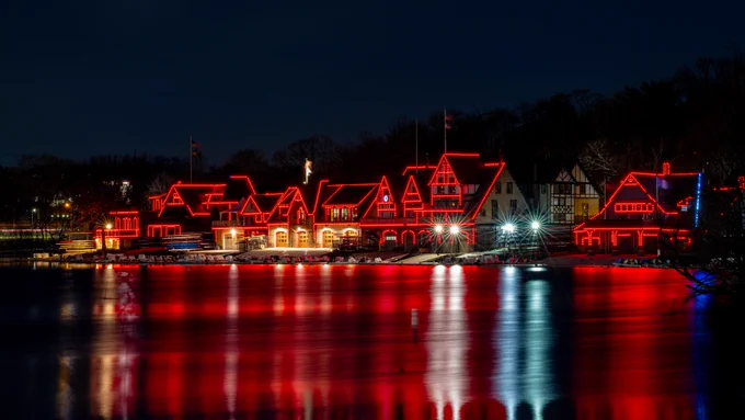 Images of Philadelphia landmarks are photographed lit up red for the Phillies home opener