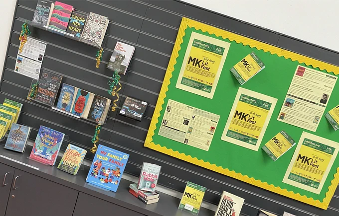 A display about MK Lit Fest with books from authors that will be attending.