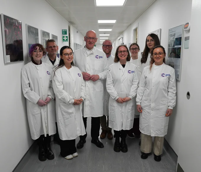 First Minister John Swinney meets researchers at the Cancer Research UK Scotland Institute. 