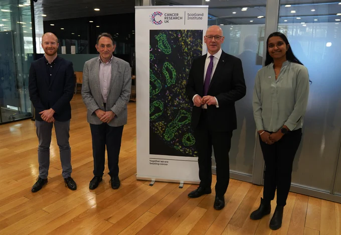 First Minister John Swinney with campaign ambassadors the Cancer Research UK Scotland Institute. 