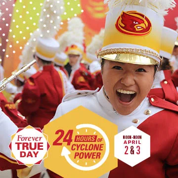 Band member in a white, red, and gold uniform with a big smile, performing in an Iowa State University Cyclone marching band at a festive event. Text overlays promote 'Forever True Day' and '24 Hours of Cyclone Power' on April 2 & 3.