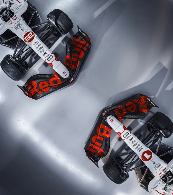 Max and Yuki's white RB21s side by side.
