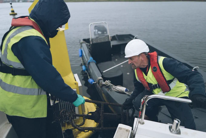 Tim and Dave from the environment team recovering sonde (water quality instrument) site 34. Credit: Nick Pumphrey