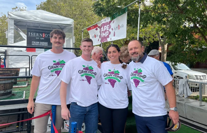Photo of students wearing Grape Stomp shirts. 